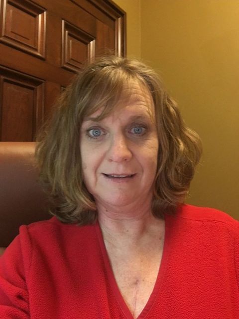 Heart surgery patient showing incision scar on "Go Red for Women" day