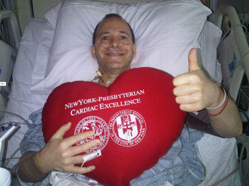 Heart Surgery Patient In Hospital With Big Red Pillow