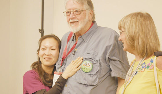 Woman hugging man at Patient Day