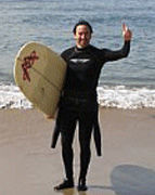 Heart valve patient holding surfboard