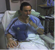 Patient Using Incentive Spirometer After Heart Surgery