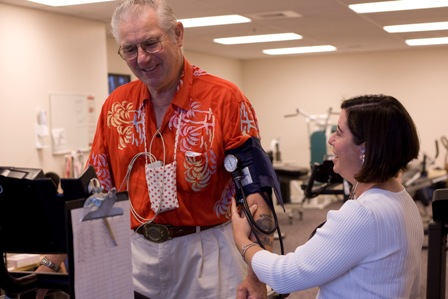 Oldler Man On Treadmill Doing Cardiac Rehab