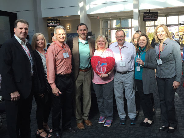 HeartValveSurgery.com community members holding big red pillow