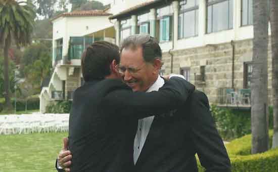 Jerry Pick and Adam Pick hugging each other