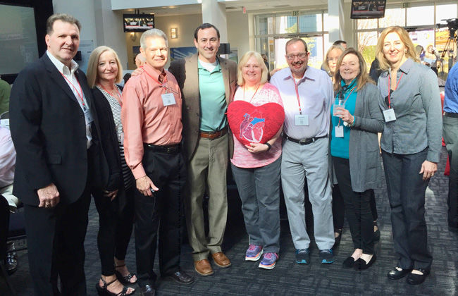 Heart Valve Disease Patients Holding Heart Pillow