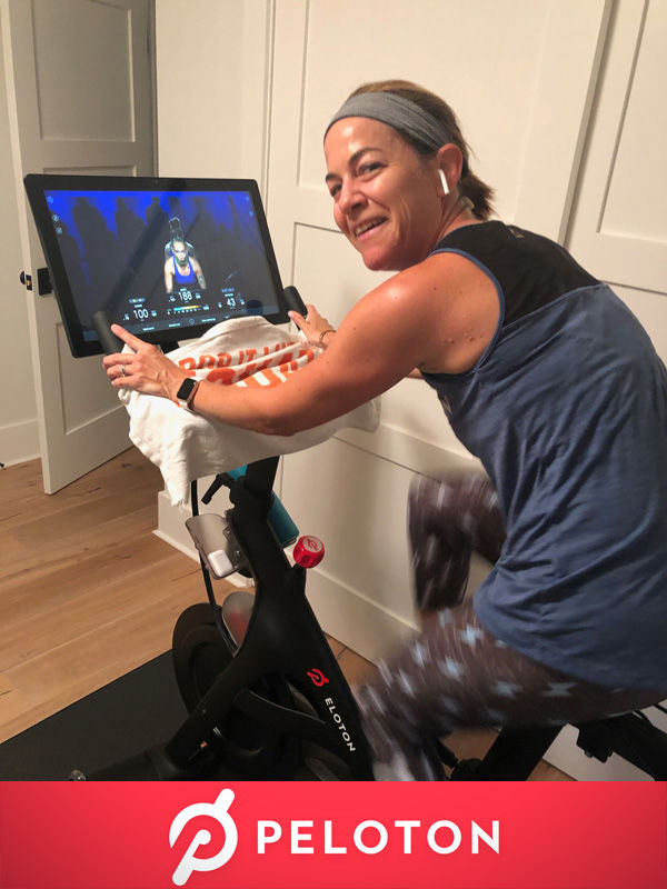 Robyn Pick riding the Peloton bike
