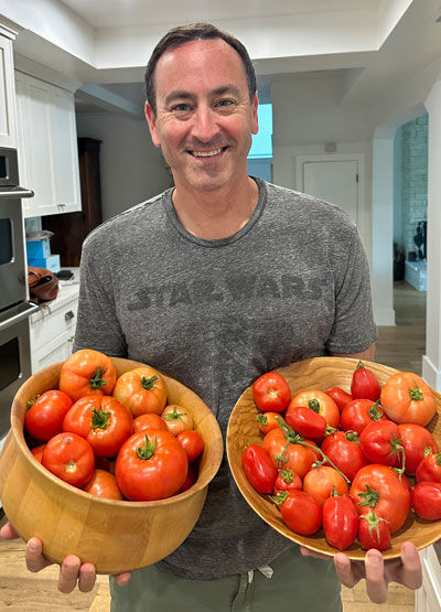 Adam Pick Tomatoes Gardening