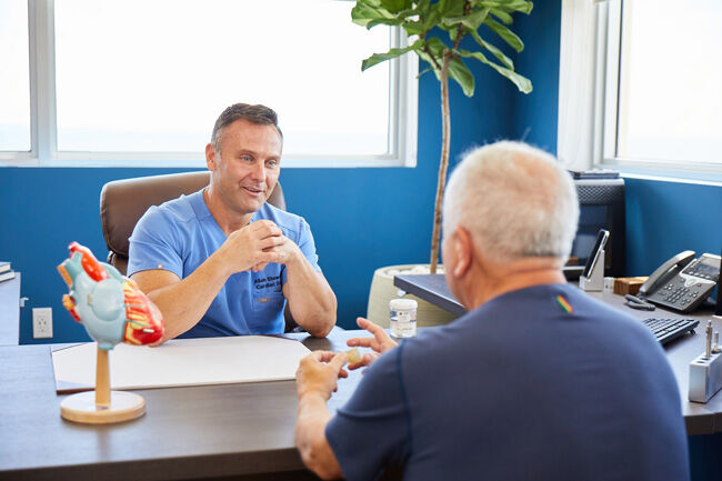 Dr. Allan Stewart With Patient in Miami, Florida